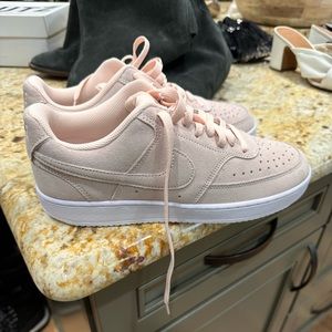 Pink Nike suede shoes